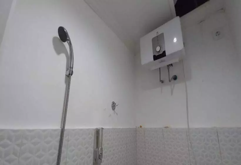 هتل Capital O 93533 Griya Denok