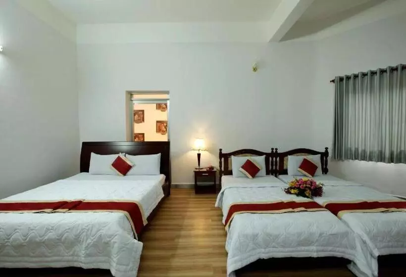 تختخواب و صبحانه Nhà Nghỉ Hoàng Yến Phan Rang