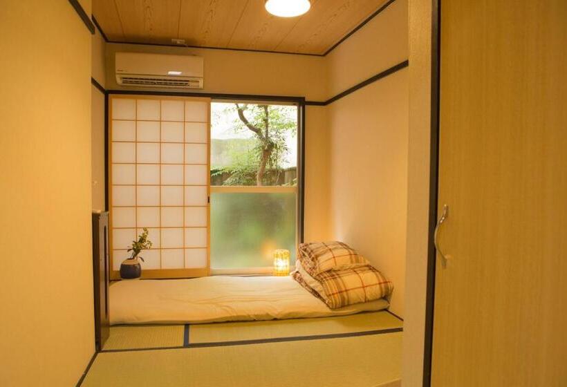 Pension (Hôtel basse catégorie) Riusu   流苏