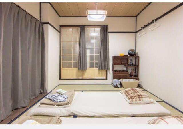 Pension (Hôtel basse catégorie) Riusu   流苏