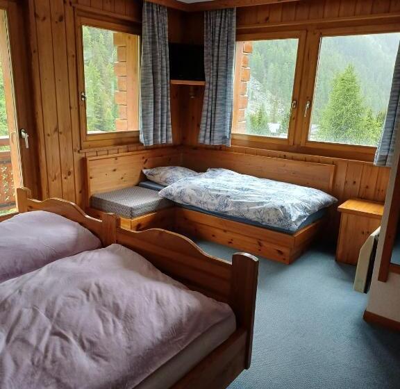 호텔 Hôtel Garni Les Bouquetins