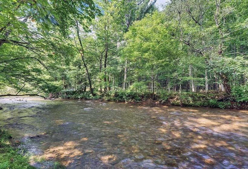 Riverfront Cabin W/ Hot Tub & Mountain Views!