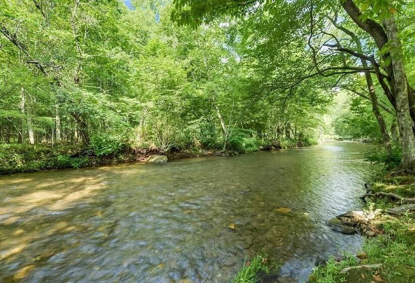 Riverfront Cabin W/ Hot Tub & Mountain Views!