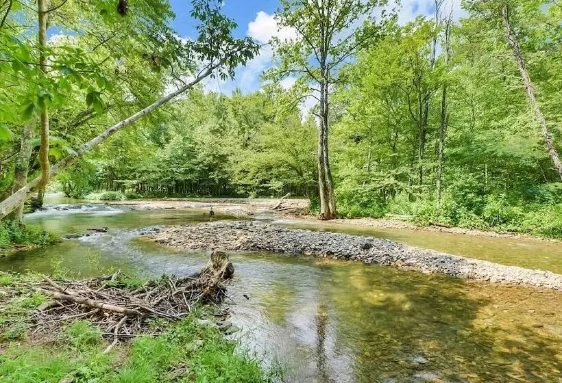 Riverfront Cabin W/ Hot Tub & Mountain Views!
