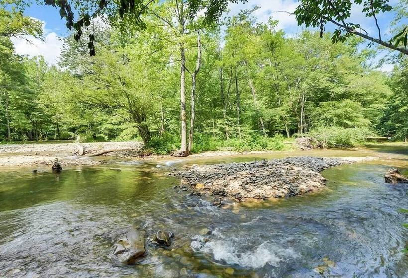 Riverfront Cabin W/ Hot Tub & Mountain Views!