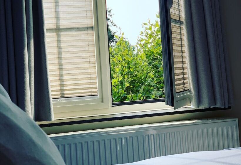 בית מלון כפרי Au Nom De Dieu