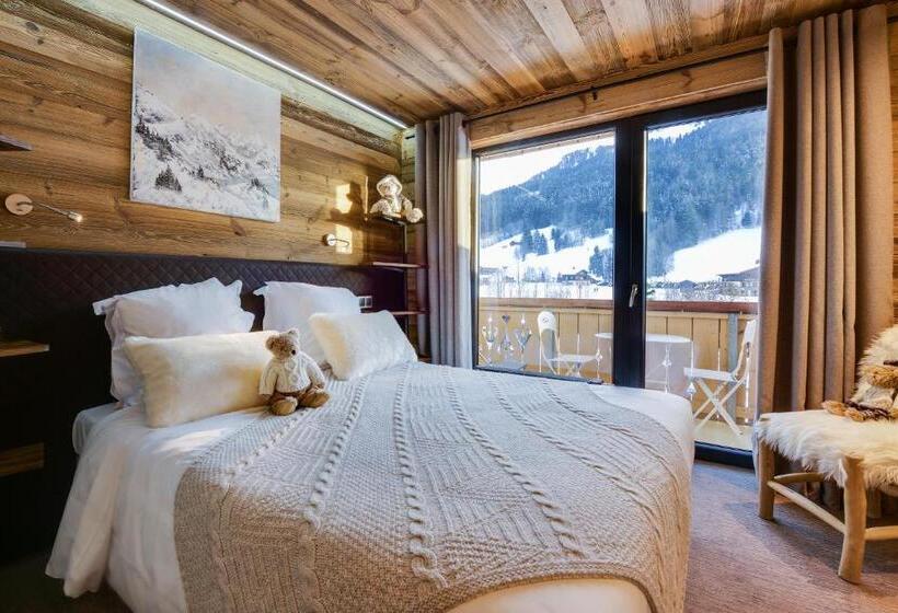 호텔 Hôtel Chalet Les Ecureuils Restaurant, Sauna & Spa Garage