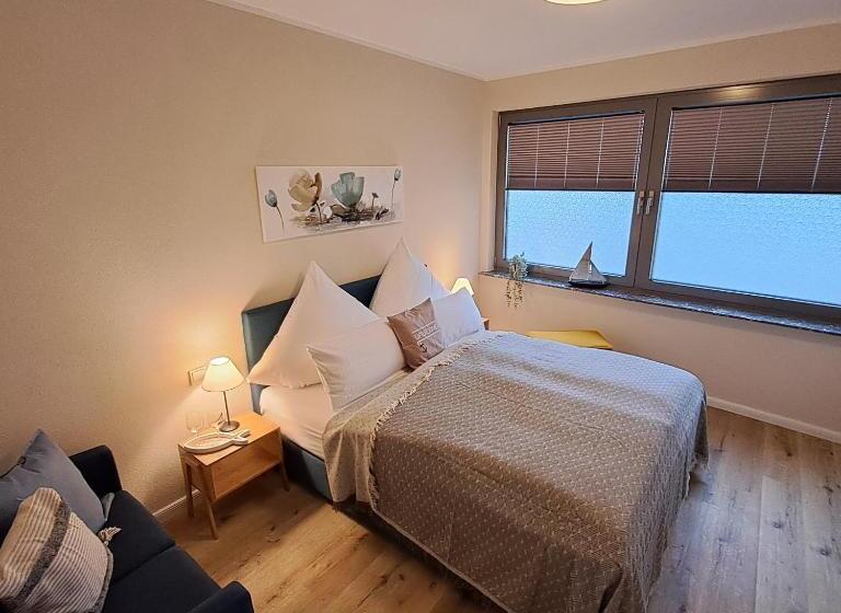 ホテル Ferienwohnungen Cafe Maarblick