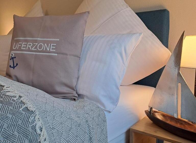 ホテル Ferienwohnungen Cafe Maarblick