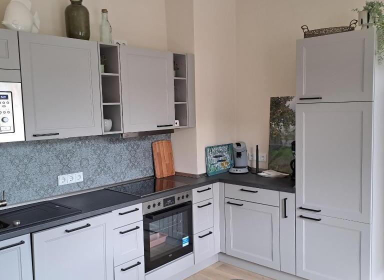 ホテル Ferienwohnungen Cafe Maarblick