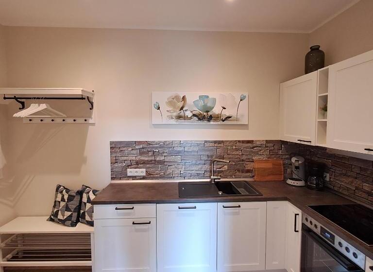 ホテル Ferienwohnungen Cafe Maarblick