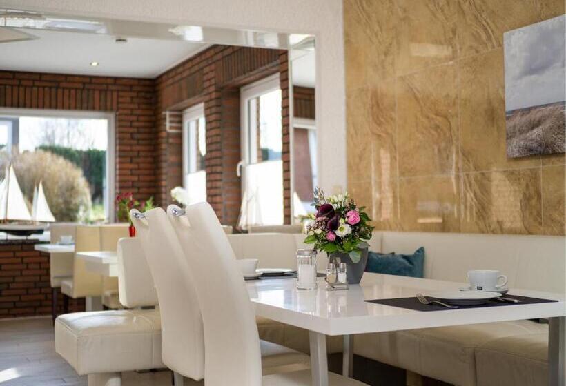 Отель Tom S Hus Heiligenhafen