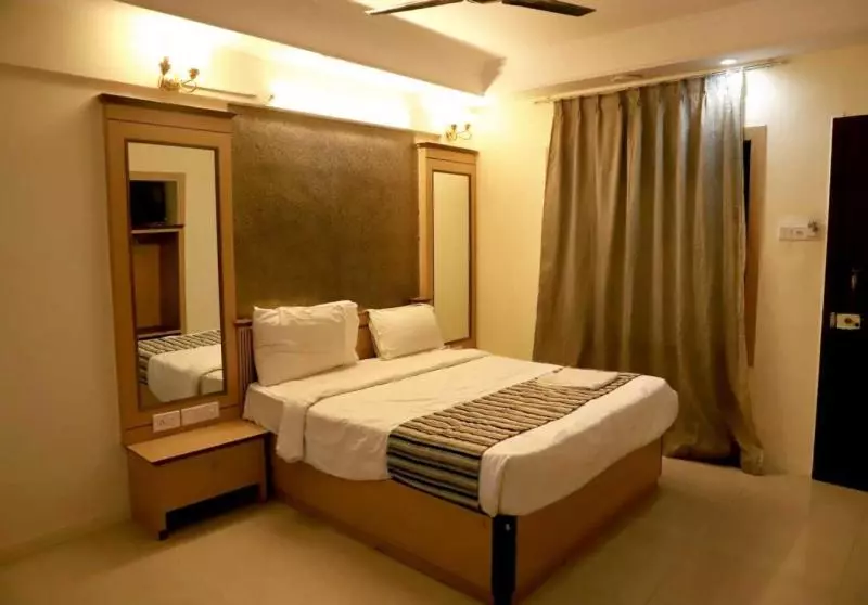 ホテル Ishwar Inn By Joy Suites