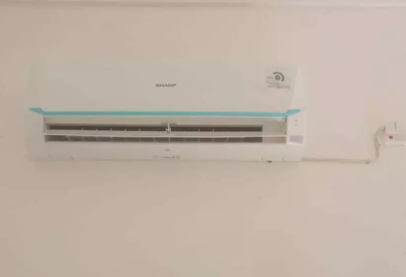 هتل Oyo 93866 Neva Guest House Syariah