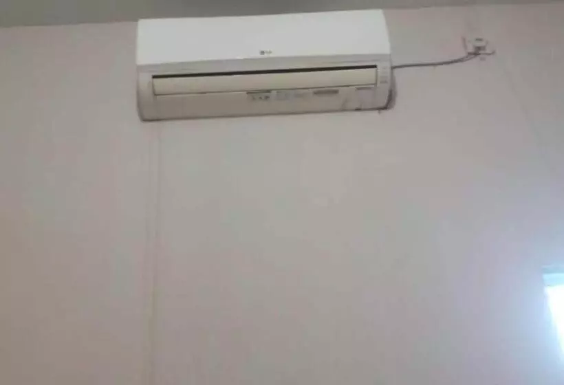 هتل Oyo 93866 Neva Guest House Syariah