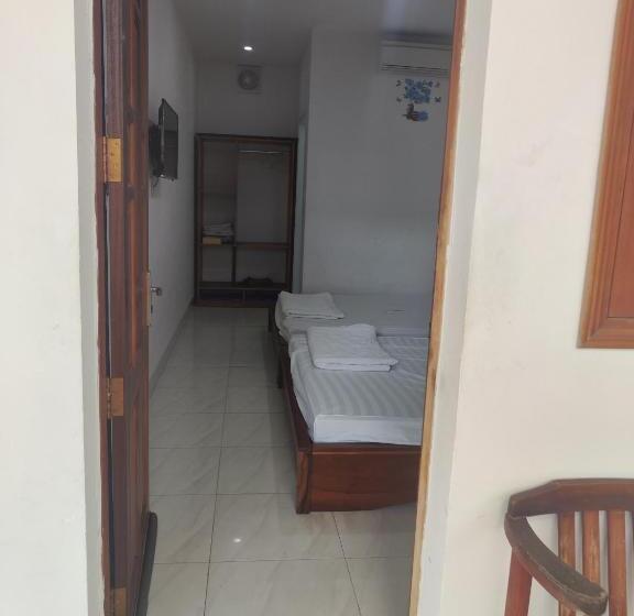 تختخواب و صبحانه Nhà Nghỉ Phú Quý