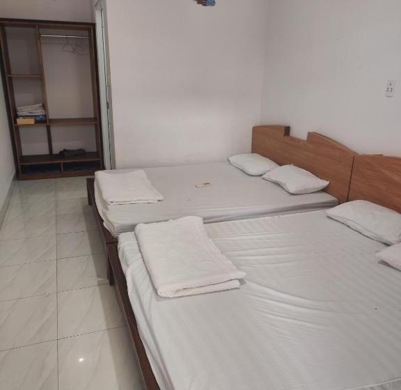 تختخواب و صبحانه Nhà Nghỉ Phú Quý