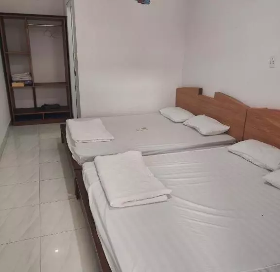 تختخواب و صبحانه Nhà Nghỉ Phú Quý
