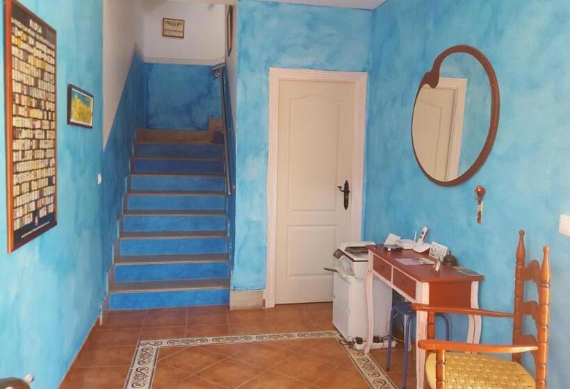 호스텔 Hostal A La Sombra Del Laurel