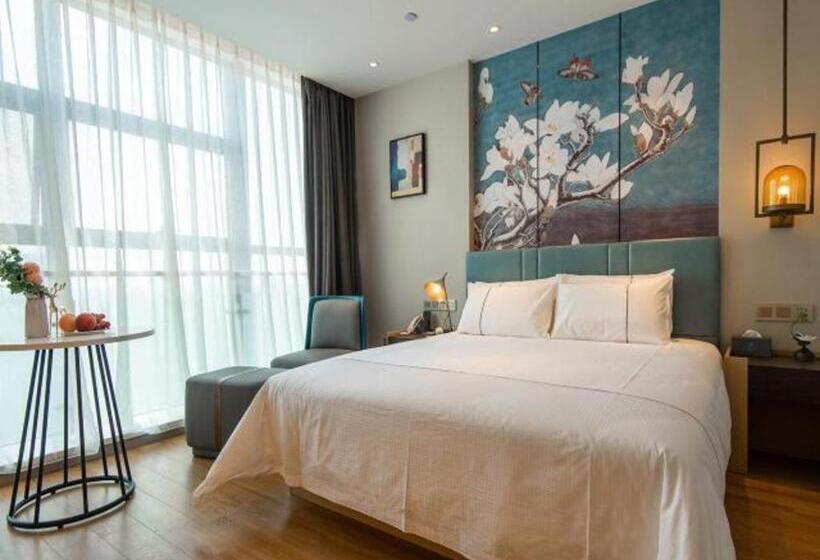 Magnotel Tongxiang Shimao Center