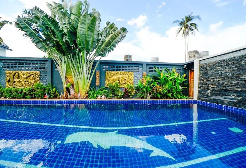 مبيت وإفطار Nid's Bungalows