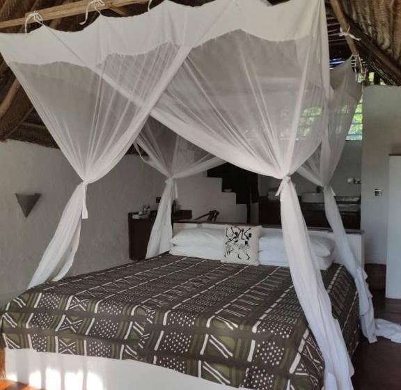 בית מלון כפרי Kae Funk Sunset Bungalows