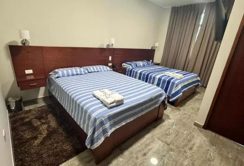 Caruzo Hotel And Suites