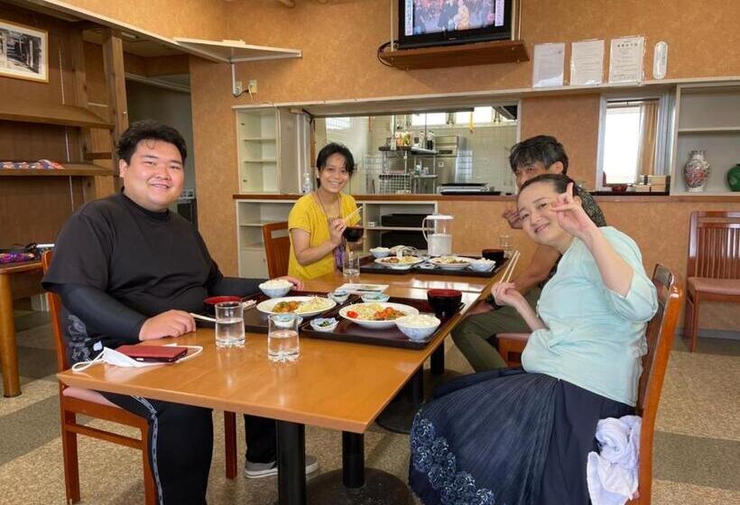 فندق 魚島観光センター