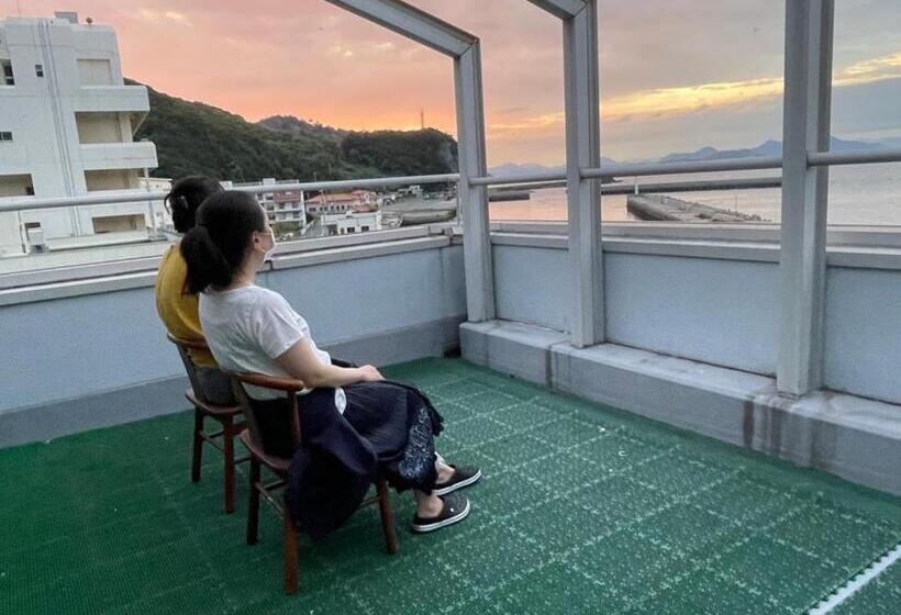 فندق 魚島観光センター