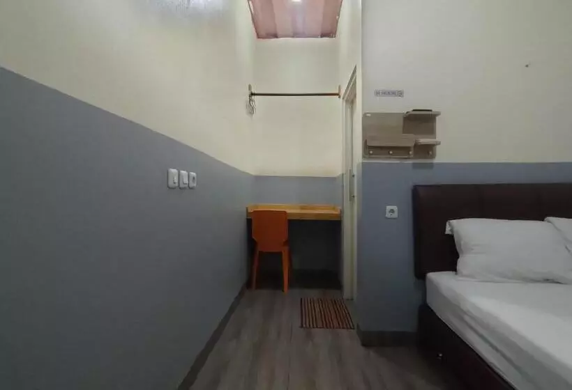 Hotelli Puspiptek Residence Syariah Mitra Reddoorz