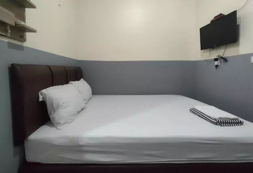 Hotelli Puspiptek Residence Syariah Mitra Reddoorz