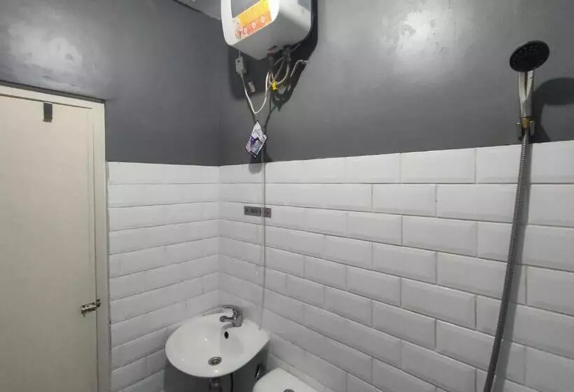 Hotelli Puspiptek Residence Syariah Mitra Reddoorz