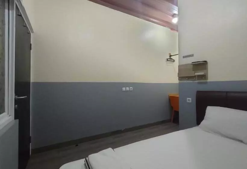 Hotelli Puspiptek Residence Syariah Mitra Reddoorz