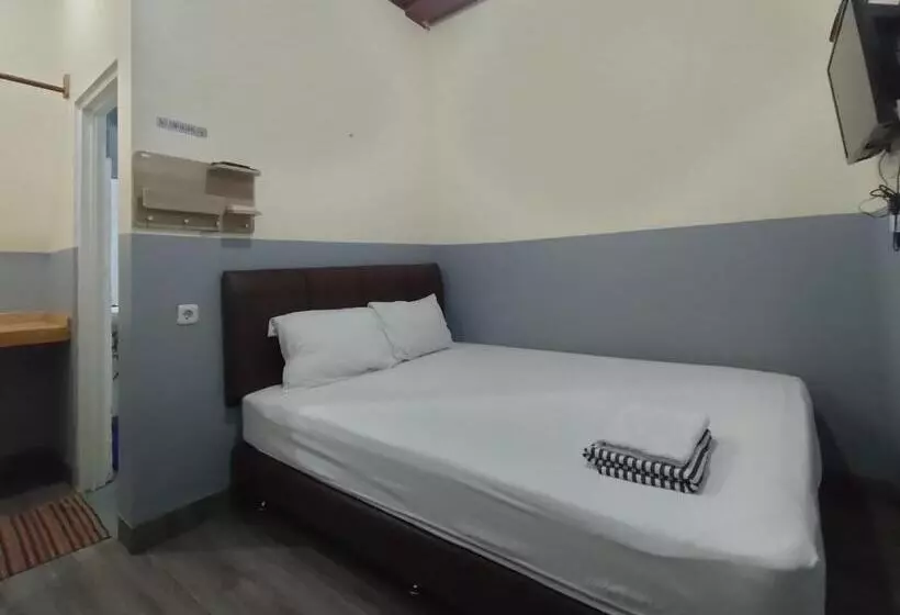 Hotelli Puspiptek Residence Syariah Mitra Reddoorz