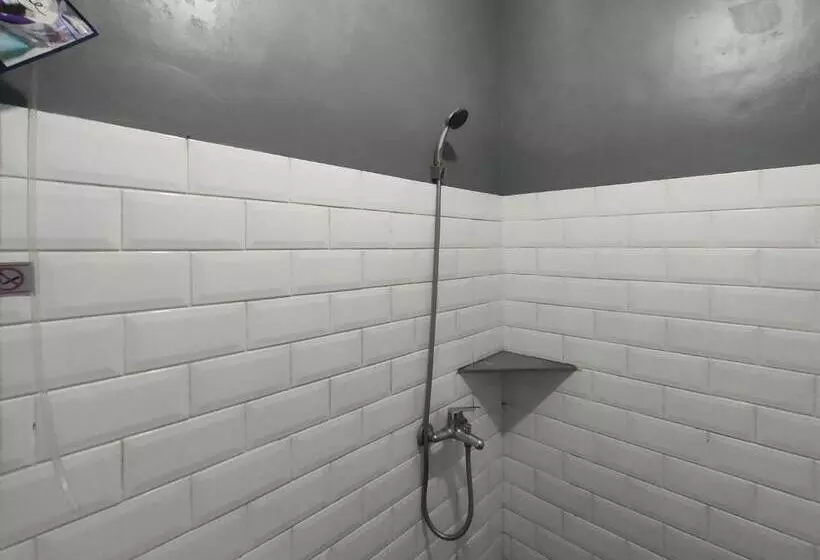 Hotelli Puspiptek Residence Syariah Mitra Reddoorz