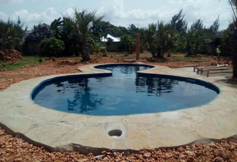 تختخواب و صبحانه Bahati Diani House Glamping