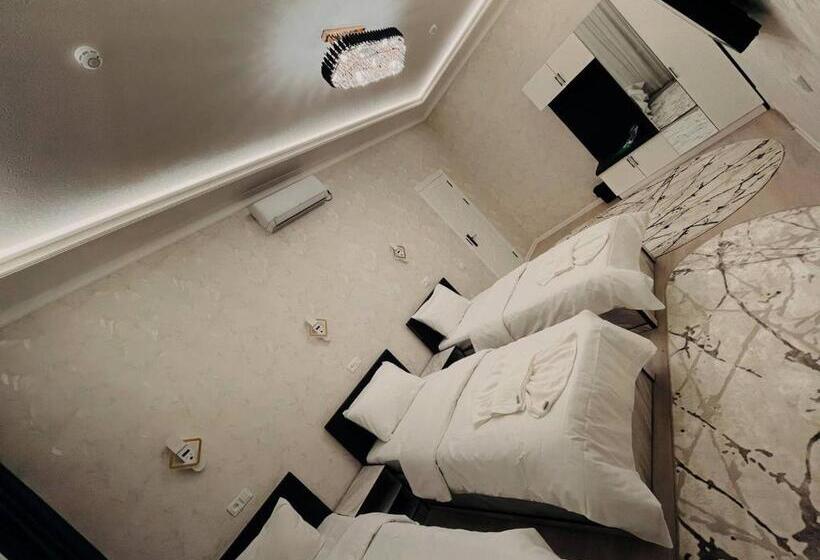 בית מלון כפרי Status Inn