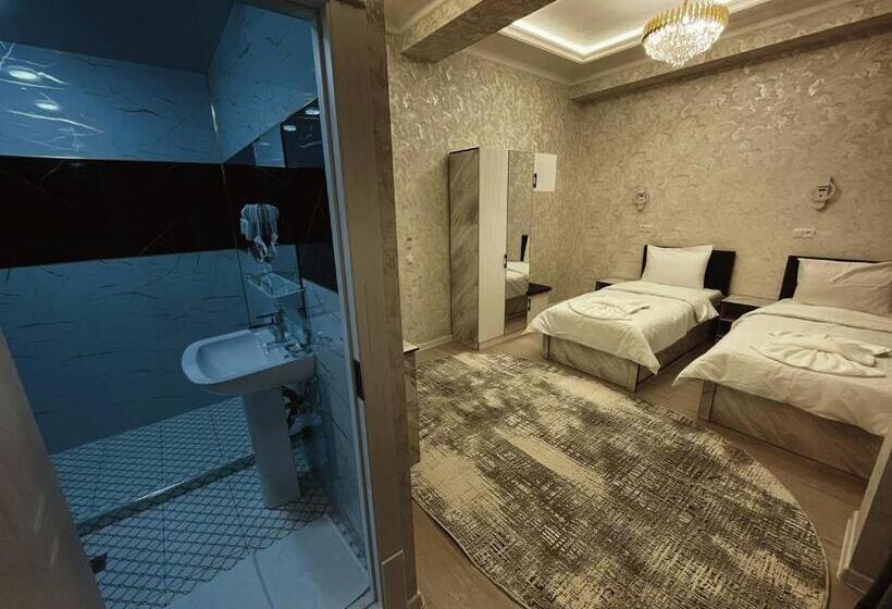 בית מלון כפרי Status Inn