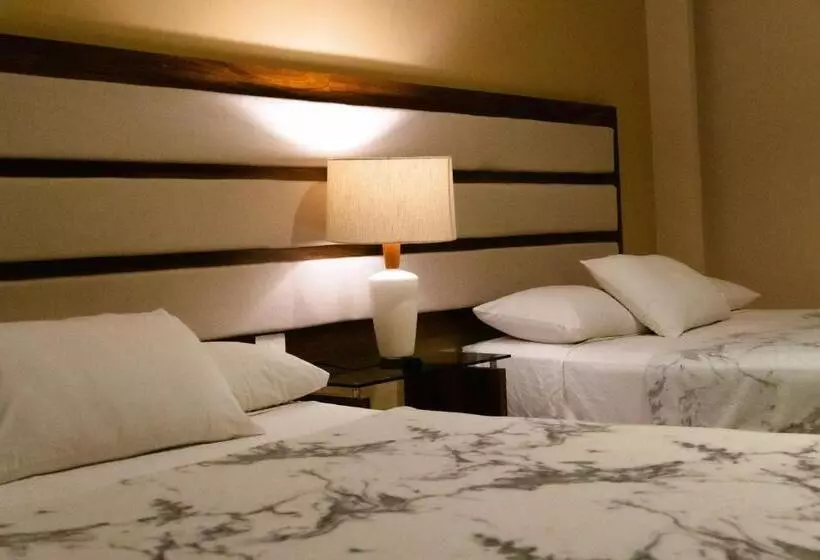 Infinity Suites Habitación Triple