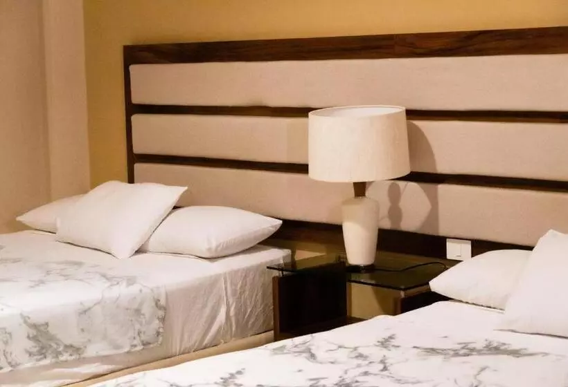 Infinity Suites Habitación Triple