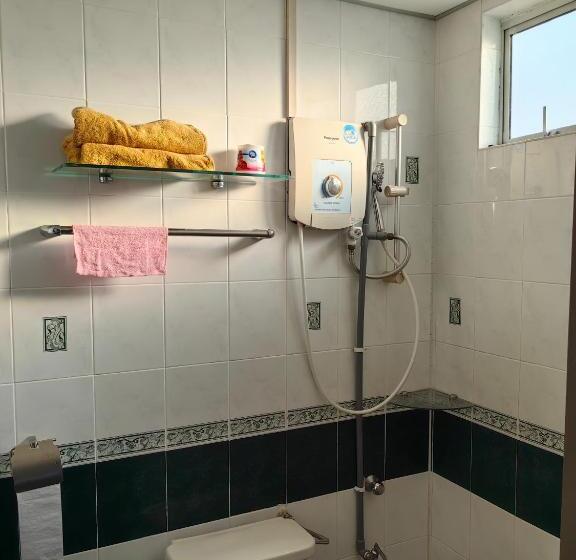 Отель Leisure Homestay Glory Beach