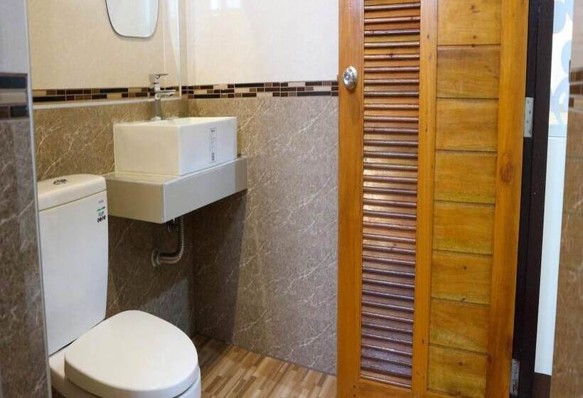 酒店 Capital O 75521 Sang Siri Apartment