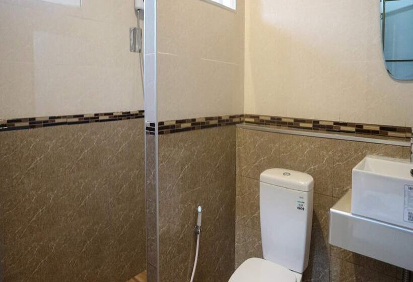 酒店 Capital O 75521 Sang Siri Apartment