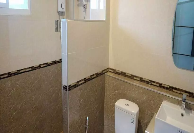 ホテル Capital O 75521 Sang Siri Apartment