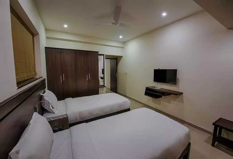 ホテル Sinq Suites