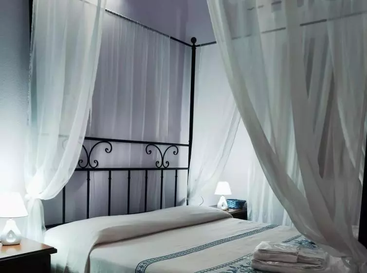 تختخواب و صبحانه Donna Violante Porto Corallo Affittacamere