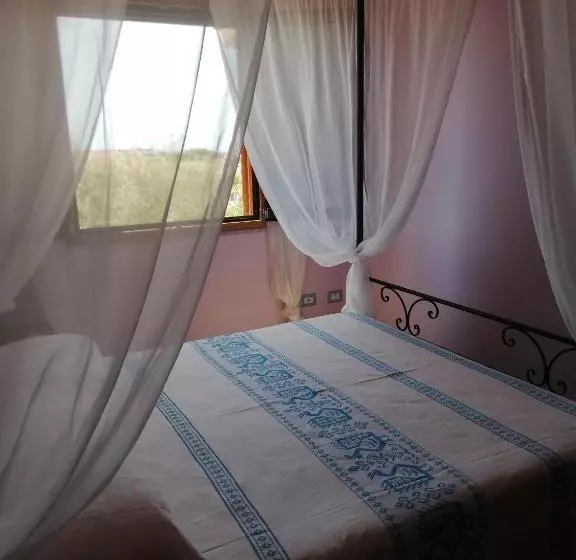 تختخواب و صبحانه Donna Violante Porto Corallo Affittacamere