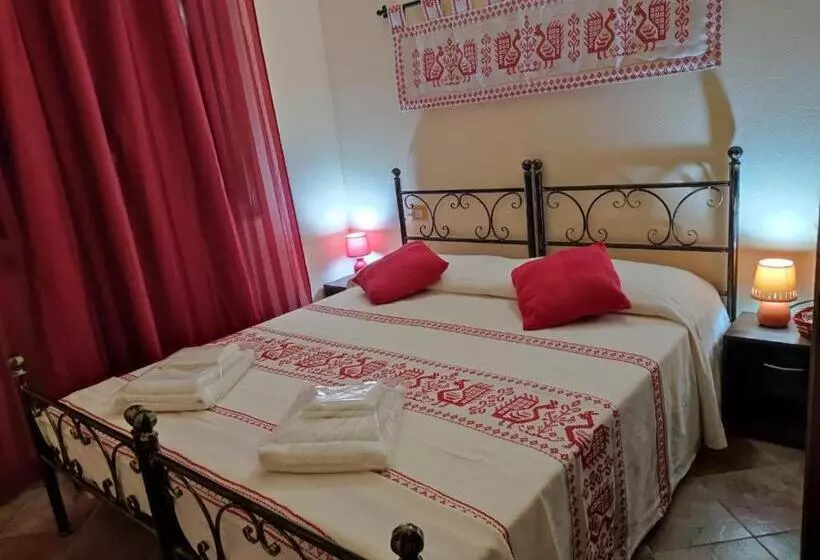 تختخواب و صبحانه Donna Violante Porto Corallo Affittacamere