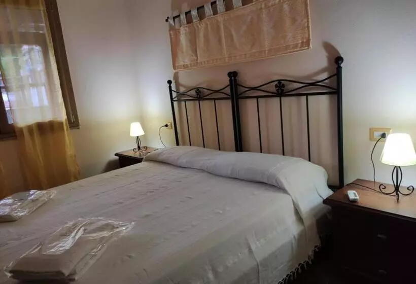 تختخواب و صبحانه Donna Violante Porto Corallo Affittacamere