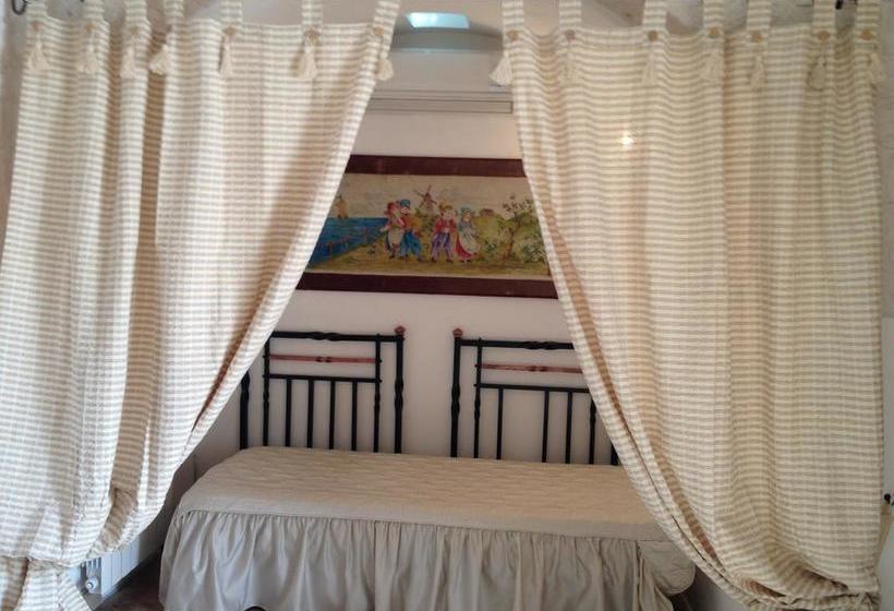 تختخواب و صبحانه Trullicolarossa